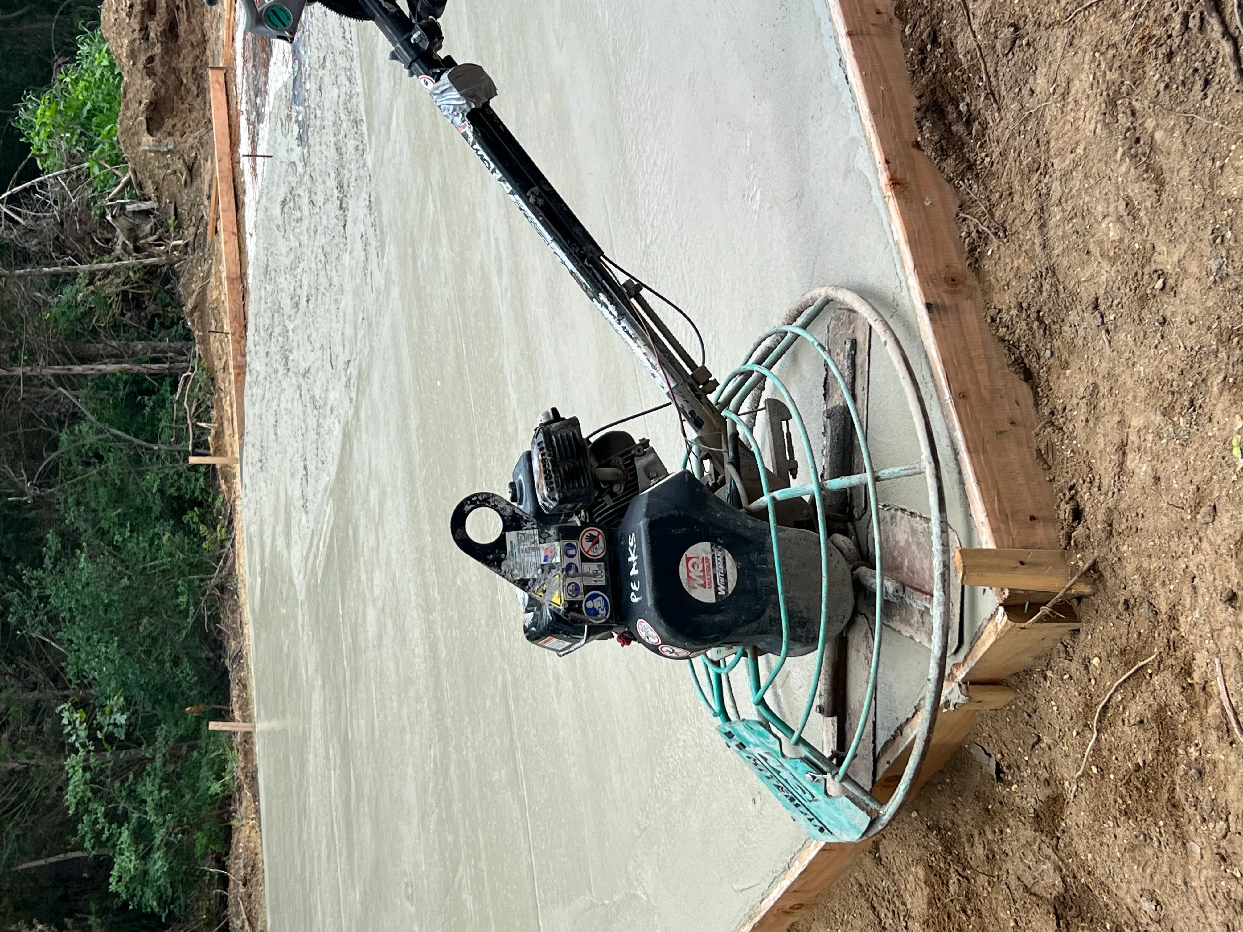 Post-frame building foundation